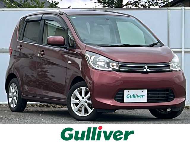 三菱 ｅＫワゴン G 岩手県 2013(平25)年 9.5万km チェリーブラウンパール ナビ　バックカメラ　フルセグ　Ｂｌｕｅｔｏｏｔｈ　ＣＤ／ＤＶＤ再生　本革巻きステアリング　自動調光ミラー　イモビライザー　坂道発進補助装置　衝突安全ボディー　純正ＡＷ　純正フロアマット　スマートキー