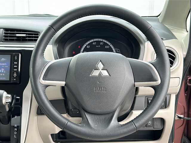 三菱 ｅＫワゴン G 岩手県 2013(平25)年 9.5万km チェリーブラウンパール ナビ　バックカメラ　フルセグ　Ｂｌｕｅｔｏｏｔｈ　ＣＤ／ＤＶＤ再生　本革巻きステアリング　自動調光ミラー　イモビライザー　坂道発進補助装置　衝突安全ボディー　純正ＡＷ　純正フロアマット　スマートキー