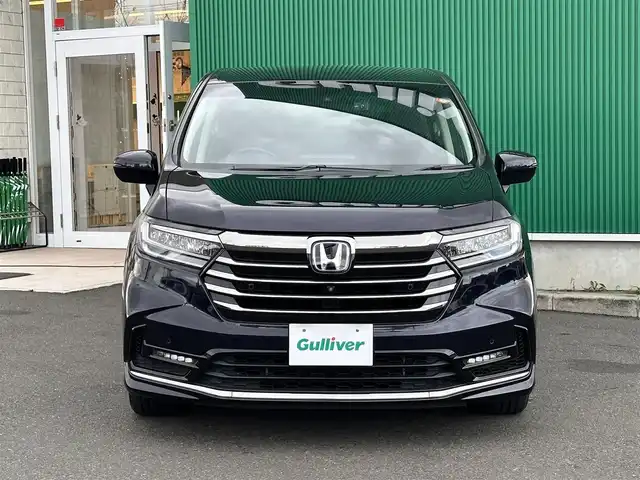 ホンダ オデッセイ ハイブリッド e:HEVアブソルート 宮城県 2021(令3)年 6.9万km プレミアムヴィーナスブラックP ホンダセンシング/・衝突軽減ブレーキ/・歩行者事故低減ステアリング/・アダプティブクルーズコントロール/・車線維持支援システム/・路外逸脱抑制機能/・誤発進抑制機能/・先行車発進お知らせ機能/・標識認識機能/・後方誤発進抑制機能/パーキングセンサーシステム/スマートパーキングアシストシステム/マルチビューカメラシステム/フリップダウンモニター（TVM-FW1300）/純正10インチナビ（VXU-217DYi）/・CD/DVD/・Bluetooth/・フルセグTV/ビルトインETC2.0/ドライブレコーダー/ハーフレザーシート/ジェスチャーコントロールパワースライドドア（運転席側/助手席側）/運転席パワーシート/2列目プレミアムクレードルシート/革巻きステアリング/ステリングスイッチ/電動パーキングブレーキ/ブレーキホールド/LEDヘッドランプ/フォグランプ/オートライト/スマートキー＆プッシュスタート/スペアキー1本/電動格納ミラー/純正17インチAW/純正フロアマット/W/サイド/カーテンエアバッグ