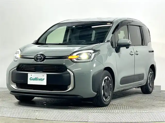 トヨタ シエンタ Z 大阪府 2023(令5)年 1.8万km アーバンカーキ 純正8incDオーディオナビ バックカメラ レーダークルコン 衝突軽減ブレーキ レーンアシスト オートハイビーム ブラインドSM 両側パワースライドドア クリアランスソナー 前後ドライブレコーダー ETC2.0