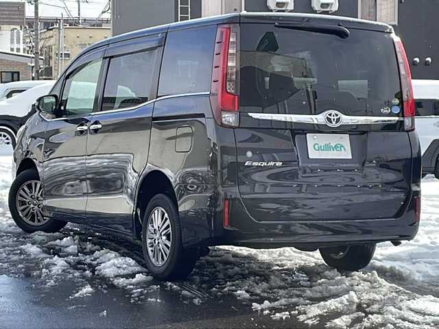 トヨタ エスクァイア Gi 道北・旭川 2015(平27)年 7.2万km スパークリングブラックパールクリスタルシャイン /4WD//禁煙車//純正9型ナビ//CD/DVD/SD/MSV/BT/フルセグ//純正11型フリップダウンモニター//両側パワースライドドア//合皮黒シート//シートヒーター//バックカメラ//クルーズコントロール//アイドリングストップ//オートハイビーム//オートライト//LEDヘッドライト//フォグライト//ビルトインETC//前後ドライブレコーダー//オートリトラミラー//サンシェード//純正フロアマット//ドアバイザー//プッシュスタート//保証書
