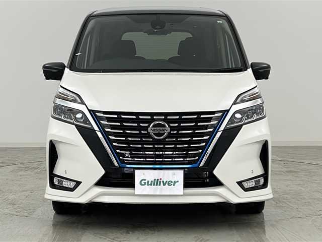 日産 セレナ e－パワー ハイウェイスター V 宮城県 2021(令3)年 2.4万km ブリリアントホワイトパール 2トーン 純正11インチフリップダウンモニター/プロパイロット/アラウンドビューモニター/エマージェンシーブレーキ/車線逸脱警報/オートハイビーム/アダプティブクルーズコントロール/ブラインドスポットモニター/前後コーナーセンサー/インテリジェントルームミラー/純正10インチナビ/・CD.DVD.BT.SD/フルセグTV/両側パワースライドドア/ハンズフリーオートスライドドア/純正ドライブレコーダー（FR）/ビルトインETC/LEDヘッドライト/LEDフォグランプ/横滑り防止装置/電動パーキングブレーキ/プッシュスタート/スマートキー/純正15インチアルミホイール/純正フロアマット/後席ロールサンシェード/シートバックテーブル/シート背面USBソケット