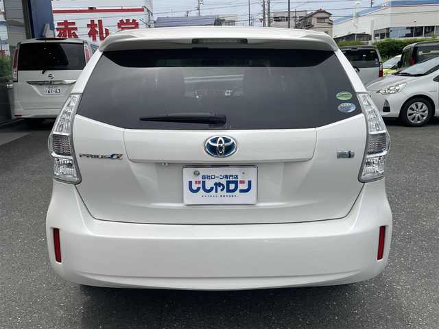 トヨタ プリウス α S Lセレクション 愛知県 2013(平25)年 10万km ホワイトパールクリスタルシャイン (株)IDOMが運営する【じしゃロン豊川店】の自社ローン専用車両になります。こちらは現金またはオートローンご利用時の価格です。自社ローンご希望の方は別途その旨お申付け下さい/ 社外メモリナビ/　◯ CD再生機能/　◯ DVD再生機能/　◯ フルセグ対応TV/　◯ BT対応/ バックカメラ/ ETC/ ステアリングスイッチ/ プッシュスタート/ オートライト/ ドアバイザー/ ウインカーミラー/ 純正フロアマット