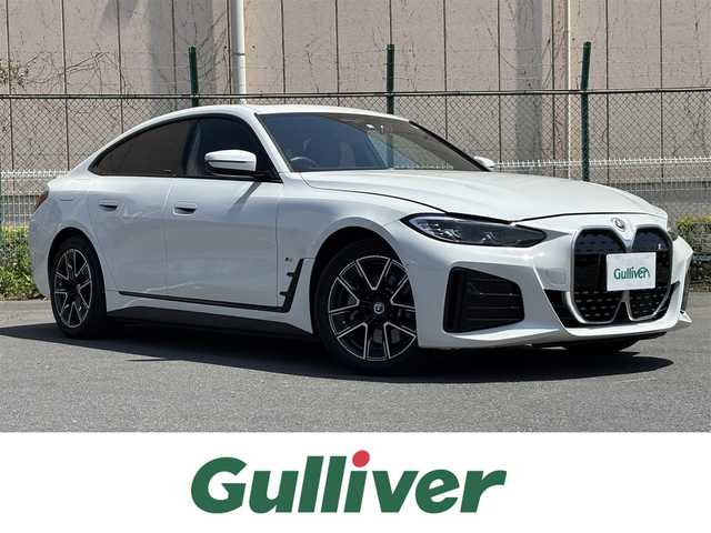ＢＭＷ ＢＭＷ ｉ４ eDrive40 Mスポーツ 東京都 2022(令4)年 1.4万km アルピンホワイトⅢ サンルーフ　/ライブコックピッドＨＤＤナビカーブドディスプレィ　/＊AppleCarPlay対応/＊BluetoothAudio/合皮アルカンターラ―コンビスポーツシート　/ディフューザー付きエアロ/ＨｉＦｉスピーカーシステム　/前席レザーパワーシート　/＊シートヒーター　/パワーバックドア　/ドラビングアシスト/＊高速道路渋滞時ハンズオフアシスト/＊トラフィックサインアシスト/＊アクティブクルーズコントロール/＊レーンディパーチャーウォーニング/＊衝突回避被害軽減ブレーキ/＊前車接近警告機能/＊ステアリングレーンコントロールアシスト/＊レーンチェンジアシスト/＊レーンキーピング足氏と/AUOTOLEDヘッドライト/ヘッドアップディスプレィ/パーキングセンサー/前後ドライブレコーダー/置くだけ充電/バックカメラ/プッシュエンジンスタート/スペアキーX1/保証書＆取説