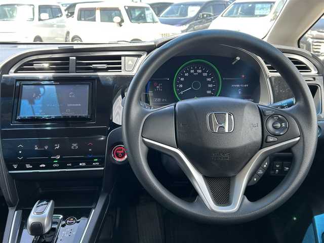ホンダ シャトル ハイブリッド ホンダセンシング 島根県 2019(平31)年 8.5万km プラチナホワイトパール 4WD/社外ナビ/CD/ワンセグTV/レーダークルーズコントロール/スマートキー/スペアキー /プッシュスタート/ホイール付きスタッドレス積込/フロアマット/ドアバイザー/ドライブレコーダー/ETC/電動格納ミラー/レーンキープ/Fワイパーデアイサー
