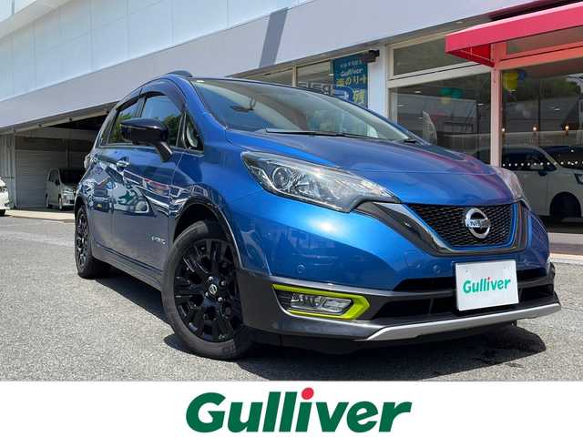 日産 ノート e-パワーXシーギア ツーリングパッケージ 長崎県 2018(平30)年 4.2万km シャイニングブルー 登録時41996km/純正ナビ/Bluetoothaudio/TV/DVD/AM.FM/全方位カメラ/ETC/デジタルインナーミラー/前方ドライブレコーダー/電動格納ミラー/純正アルミホイール/純正フロアマット