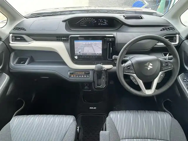 スズキ ソリオ HV MZ 東京都 2024(令6)年 0.1万km タフカーキパールメタリック 純正ナビ/全方位モニター/デュアルカメラブレーキサポート/車線逸脱警報機能/パーキングソナー/シートヒーター/アダプティブクルーズコントロール/両側電動ドア/横滑り防止措置/アイドリングストップ