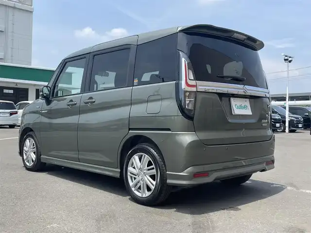 スズキ ソリオ HV MZ 東京都 2024(令6)年 0.1万km タフカーキパールメタリック 純正ナビ/全方位モニター/デュアルカメラブレーキサポート/車線逸脱警報機能/パーキングソナー/シートヒーター/アダプティブクルーズコントロール/両側電動ドア/横滑り防止措置/アイドリングストップ