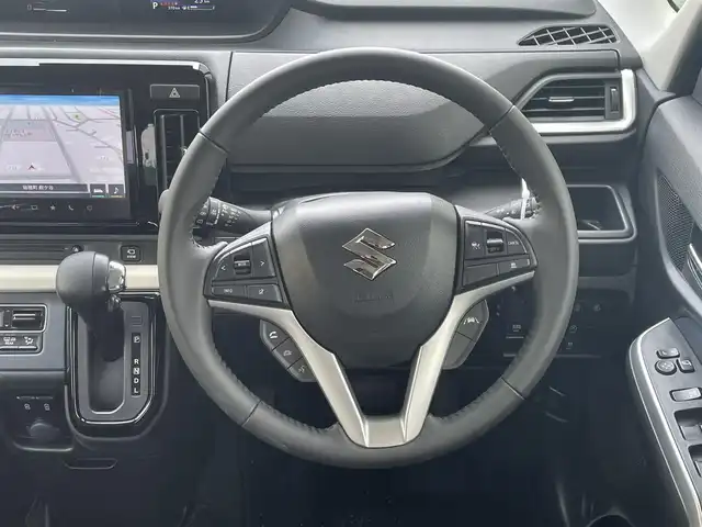 スズキ ソリオ HV MZ 東京都 2024(令6)年 0.1万km タフカーキパールメタリック 純正ナビ/全方位モニター/デュアルカメラブレーキサポート/車線逸脱警報機能/パーキングソナー/シートヒーター/アダプティブクルーズコントロール/両側電動ドア/横滑り防止措置/アイドリングストップ