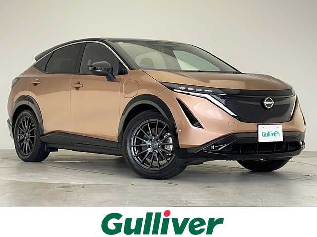 日産 アリア B6 愛知県 2022(令4)年 1.8万km ゴールド プロパイロット/衝突軽減システム/BOSEプレミアムサウンド/純正１２．３型ディスプレイオーディオ（ナビあり）/三眼LEDヘッドライト/全方位カメラ/サンルーフ/レーダークルーズコントロール/シートヒーター/フルセグ/Bluetooth/バックカメラ/電動リアゲート/パワーシート/ヘッドアップディスプレイ/コーナーセンサー/純正アルミホイール/ETC2.0/ブラインドスポットモニター/LEDヘッドライト/ステアリングヒーター/インテリジェントミラー/オートマチックハイビーム/ドライブレコーダー