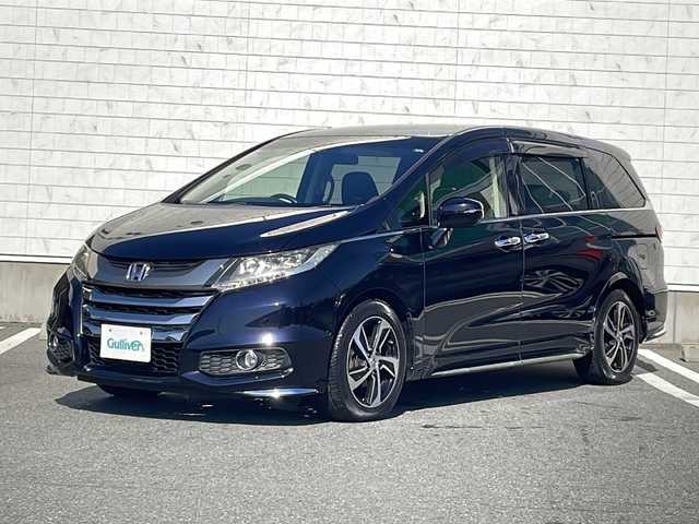 ホンダ オデッセイ アブソルート 山形県 2015(平27)年 7.5万km プレミアムヴィーナスブラックP ホンダセンシング/・SMBS(衝突軽減ブレーキ)/・誤発進抑制機能/・先行車発進お知らせ機能/・標識認識機能/・LKAS(車線維持支援システム）/・路外逸脱抑制機能/・ACC(アダプティブクルーズコントロール)/純正ナビ/（フルセグTV/DVD/Bluetooth/HDMI）/バックカメラ/ビルトインETC/純正フリップダウンモニター/パドルシフト/コーナーセンサー/アイドリングストップ/ハーフレザーシート/プッシュスタート