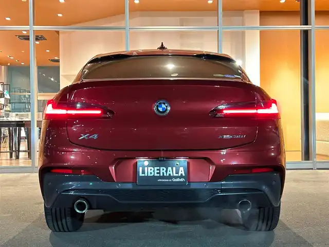 ＢＭＷ Ｘ４ xDrive 30i Mスポーツ 岐阜県 2019(令1)年 3.2万km 赤 ワンオーナー/アダプティブLEDヘッドライト/BMWヘッドアップディスプレイ/BMWライブ・コックピット/　マルチディスプレイメーターパネル/　HDDナビゲーションシステム/　電動フロントシート運転席助手席　運転席メモリー機能付/　フロントシートヒーティング/　リヤシートヒーティング/パーキングアシストプラス/　パーク・ディスタンス・コントロール/　パーキング・アシスト/　トップ・ビュー3Dビュー/　サイドビューカメラ/　リヤビューカメラ予想進路表示機能付/ドライビングアシストプラス/　アクティブクルーズコントロール　ストップゴー機能付/　ステアリング　レーンコントロールアシスト/　レーンディパーチャーウォーニング/　レーンチェンジウォーニング/　アクティブサイドコリジョンプロテクション/　前車接近警告機能/　衝突回避　被害軽減ブレーキ/　事故回避アシスト/　後車衝突警告機能/　クロストラフィックウォーニング