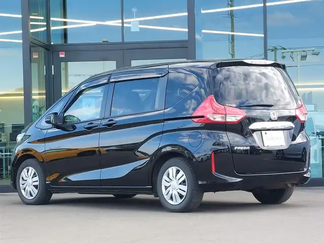 ホンダ フリード G ホンダセンシング 東京都 2020(令2)年 6.8万km プレミアムスパークルブラックパール 純正9インチナビ(VXM-207VFNi)/【DVD/CD/RADIO/TV/BT/SD】/バックカメラ/ビルトインETＣ/ドライブレコーダー/両側電動スライドドア/アダプティブクルーズコントロール/衝突軽減ブレーキ/車線維持支援システム/横滑り防止装置/アイドリングストップ/LEDヘッドライト/後席ロールサンシェイド/プッシュスタート/スマートキー