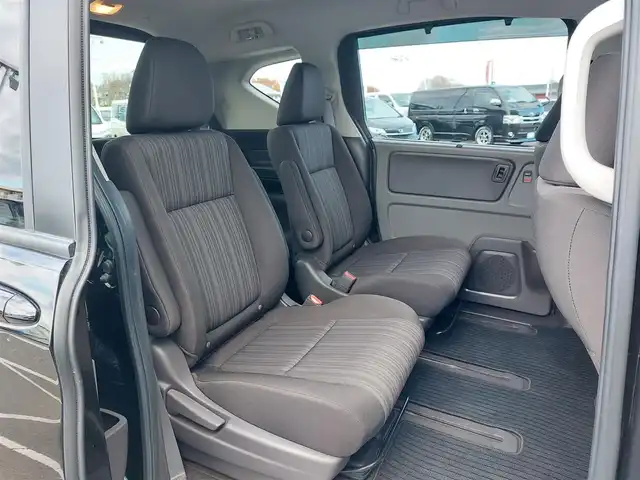 ホンダ フリード G ホンダセンシング 東京都 2020(令2)年 6.8万km プレミアムスパークルブラックパール 純正9インチナビ(VXM-207VFNi)/【DVD/CD/RADIO/TV/BT/SD】/バックカメラ/ビルトインETＣ/ドライブレコーダー/両側電動スライドドア/アダプティブクルーズコントロール/衝突軽減ブレーキ/車線維持支援システム/横滑り防止装置/アイドリングストップ/LEDヘッドライト/後席ロールサンシェイド/プッシュスタート/スマートキー