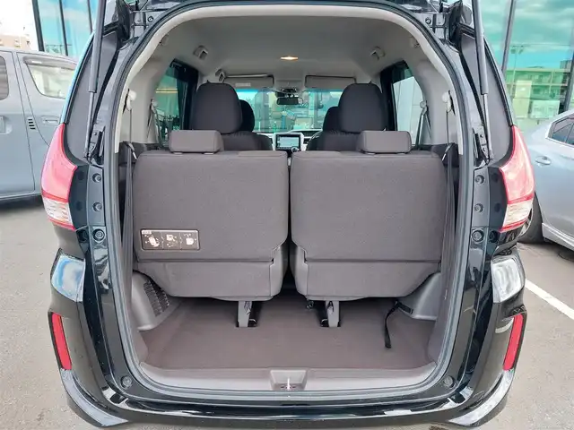 ホンダ フリード G ホンダセンシング 東京都 2020(令2)年 6.8万km プレミアムスパークルブラックパール 純正9インチナビ(VXM-207VFNi)/【DVD/CD/RADIO/TV/BT/SD】/バックカメラ/ビルトインETＣ/ドライブレコーダー/両側電動スライドドア/アダプティブクルーズコントロール/衝突軽減ブレーキ/車線維持支援システム/横滑り防止装置/アイドリングストップ/LEDヘッドライト/後席ロールサンシェイド/プッシュスタート/スマートキー