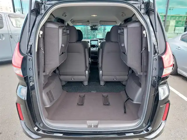 ホンダ フリード G ホンダセンシング 東京都 2020(令2)年 6.8万km プレミアムスパークルブラックパール 純正9インチナビ(VXM-207VFNi)/【DVD/CD/RADIO/TV/BT/SD】/バックカメラ/ビルトインETＣ/ドライブレコーダー/両側電動スライドドア/アダプティブクルーズコントロール/衝突軽減ブレーキ/車線維持支援システム/横滑り防止装置/アイドリングストップ/LEDヘッドライト/後席ロールサンシェイド/プッシュスタート/スマートキー