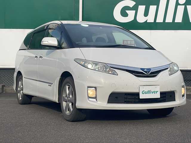 トヨタ エスティマ ハイブリッド G 福島県 2012(平24)年 15.2万km ホワイトパールクリスタルシャイン 4WD/純正HDDナビ/（AM/FM/DVD/AUX)/バックカメラ/ワンセグTV/ETC/両側電動スライドドア/シートヒーター/パワーシート/後部座席用モニター/クルーズコントロール/キセノンライト/取扱説明書