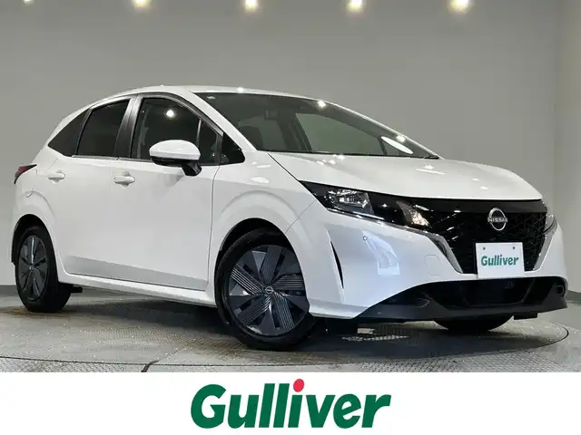 日産 ノート X 愛知県 2023(令5)年 3.9万km ピュアホワイトパール 純正９インチナビ　/（Bluetooth/フルセグTV/FM/AM/CarPlay/USB/HDMI)/アラウンドビューモニター　/ワイヤレス充電　/プロパイロット　/エマージェンシーブレーキ　/ビルトインＥＴＣ２．０　/ブラインドスポットモニター　/デジタルインナーミラー　/車線逸脱警報　/ソナー/純正フロアマット/プッシュスタート/　　-スマートキー