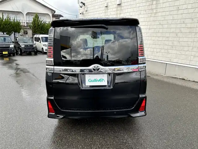 トヨタ ヴォクシー ZS 煌Ⅱ 山形県 2020(令2)年 3.9万km ブラック 純正9型ナビ/・(CD/DVD/フルセグ/BT)/フリップダウンモニター/バックカメラ/両側パワースライドドア/Toyota Safety Sense/・衝突軽減システム/・レーンキープアシスト/：オートハイビーム/クルーズコントロール/ビルトインETC2.0/純正アルミホイール/LEDヘッドライト/スマートキー