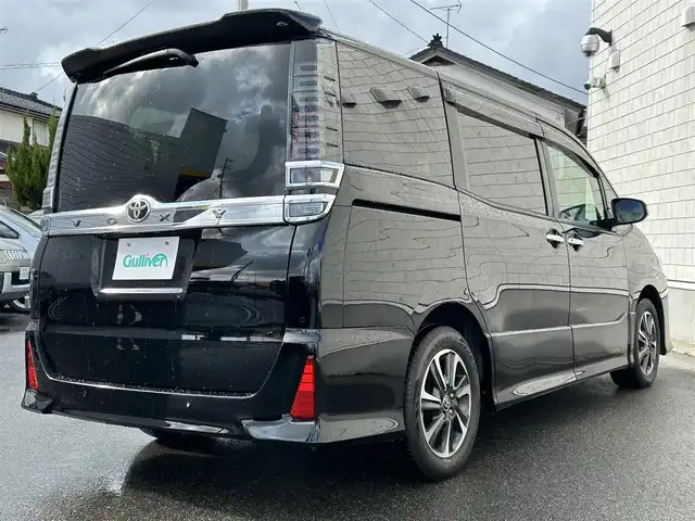 トヨタ ヴォクシー ZS 煌Ⅱ 山形県 2020(令2)年 3.9万km ブラック 純正9型ナビ/・(CD/DVD/フルセグ/BT)/フリップダウンモニター/バックカメラ/両側パワースライドドア/Toyota Safety Sense/・衝突軽減システム/・レーンキープアシスト/：オートハイビーム/クルーズコントロール/ビルトインETC2.0/純正アルミホイール/LEDヘッドライト/スマートキー