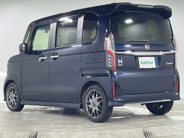 ホンダ Ｎ ＢＯＸ EX ターボ 福岡県 2023(令5)年 1万km ミッドナイトブルービームM 禁煙車純正9型SDナビ（フルセグTV/DVD/CD/BT）バックモニター純正フリップダウンモニタホンダセンシングコーナーセンサーハーフレザーシート両側パワスラETCドラレコLEDヘッドライトフォグランプスマートキー