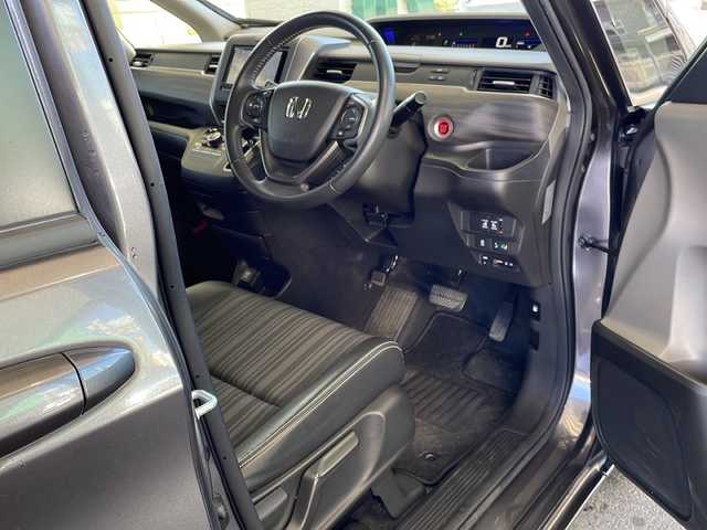 ホンダ フリード G ホンダセンシング 愛媛県 2019(令1)年 6.3万km モダンスティールM ワンオーナー/社外ナビ/・フルセグ/CD/DVD/BT/バックカメラ/ビルトインETC/ホンダセンシング/レーダークルーズコントロール/両側パワースライドドア/ステアリングスイッチ/前ドライブレコーダー/スマートキー/プッシュスタート/ウィンカーミラー