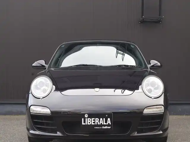 ポルシェ ９１１ カレラ 福岡県 2010(平22)年 5.7万km バサルトブラックメタリック スポーツクロノパッケージ/禁煙車/黒革シート/ナビ・フルセグTV/CD/DVD/Bluetooth/バックカメラ/ETC/シートヒーター/純正18インチAW/純正キセノンヘッドライト/USB入力端子