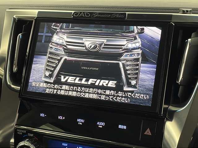 トヨタ ヴェルファイア Z Gエディション 新潟県 2018(平30)年 7.4万km ホワイトパールクリスタルシャイン ガナドールマフラー/車高調/21インチアルミホイール/三眼LEDヘッドライト/純正10インチナビ/(NSZT-Z66T)/(CD.DVD.SD.フルセグ.Bluetooth)/バックカメラ/デジタルインナーミラー/革巻きステアリング/ステアリングリモコン/トヨタセーフティセンス/・プリクラッシュセーフティ/・レーンキープアシスト/・レーダークルーズコントロール/・オートマチックハイビーム/パワーバックドア/合皮シート/前席パワーシート・ベンチレーション/コーナーセンサー/ドライブレコーダー/ステアリングヒーター/プッシュスタート/スマートキー×2/純正フロアマット