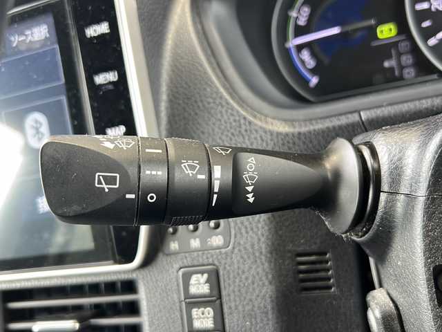 トヨタ ヴォクシー ハイブリッド ZS 煌Ⅱ 静岡県 2019(平31)年 8.2万km ブラック 【主要装備】/純正１０インチナビ　/フルセグテレビ　/純正１２インチフリップダウンモニター　/両側パワースライドドア　/純正１６インチアルミホイール　/前席シートヒーター　/ＥＴＣ　/ステアリングスイッチ　/スペアキー有り/プッシュスタート/スマートキー/クルーズコントロール/オートマチックハイビーム/プリクラッシュセーフティ