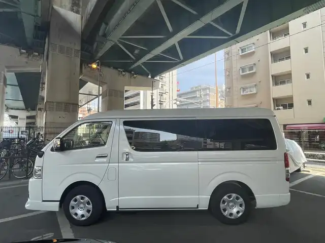 トヨタ ハイエース ファインテックツアラー 鹿児島県 2023(令5)年 2万km ホワイトパールクリスタルシャイン トヨタセーフティセンス/・プリクラッシュセーフティ/・レーンディパーチャーアラート/・オートマチックハイビーム/・パーキングブレーキサポート/モデリスタフルエアロ/トヨタ純正ナビ/・フルセグTV/・Bluetooth/・バックカメラ/・アラウンドビューモニター/純正フリップダウンモニター/両側パワースライドドア/LEDヘッドライト/オートライト/リラックスキャプテンシート/オートエアコン/プッシュスタート/ワンオーナー/新車保証書/取扱説明書
