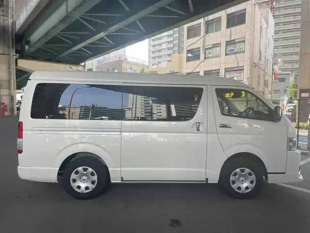 トヨタ ハイエース ファインテックツアラー 鹿児島県 2023(令5)年 2万km ホワイトパールクリスタルシャイン トヨタセーフティセンス/・プリクラッシュセーフティ/・レーンディパーチャーアラート/・オートマチックハイビーム/・パーキングブレーキサポート/モデリスタフルエアロ/トヨタ純正ナビ/・フルセグTV/・Bluetooth/・バックカメラ/・アラウンドビューモニター/純正フリップダウンモニター/両側パワースライドドア/LEDヘッドライト/オートライト/リラックスキャプテンシート/オートエアコン/プッシュスタート/ワンオーナー/新車保証書/取扱説明書