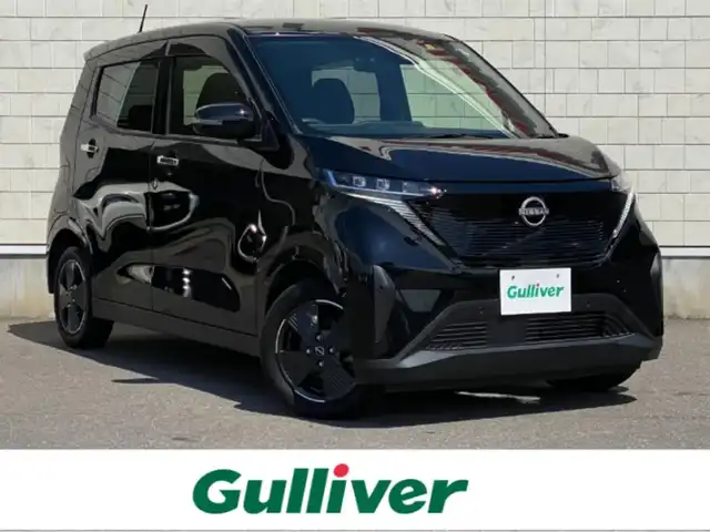 日産 サクラ X 岐阜県 2022(令4)年 4万km ブラック メーカー純正SDナビ//フルセグテレビ/Bluetooth/CD/DVD /プロパイロット /先進安全装備360°セーフティアシスト/インテリジェントエマージェンシーブレーキ/踏み間違え防止アシスト/車線逸脱防止支援システム/ふらつき警報/標識認識機能/ハイビームアシスト/純正14インチアルミホイール　/純正ドライブレコーダー　/純正フロアマット　/スマートキー×2/保証書/取扱説明書/ナビ取扱説明書/ドライブレコーダー取扱説明書