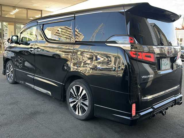トヨタ ヴェルファイア Z Gエディション 京都府 2018(平30)年 8.4万km ブラック アルパイン11インチナビ/アルパイン12.8インチフリップダウンモニター/フルセグテレビ/走行中視聴可能/DVD視聴可能/バックカメラ/Bluetooth/サンルーフ/admirationエアロ/adimrationマフラー/三眼LEDヘッドライト/シーケンシャルウィンカー/デジタルインナーミラー/カーアロマ/メモリーパワーシート/シートヒーター＆ベンチレーション/オットマン/ステアリングヒーター/両側パワースライドドア/トヨタセーフティーセンス/レーダークルーズコントロール/クリアランスソナー/パーキングサポートブレーキ/プリクラシュセーフティー/ロードサインアシスト/レーンキープアシスト/ブレーキホールド/禁煙車/ビルトインETC/純正フロアマット/電動格納ウィンカーミラー