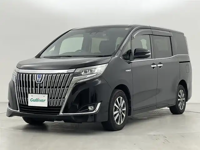 トヨタ エスクァイア ハイブリッド Xi 群馬県 2019(平31)年 11.9万km ブラック SRSエアバック(サイド/カーテン)/＝＝＝＝＝/純正9インチナビ(NSZT-Y68T)/・AM/FM/CD/DVD/SD/Bluetooth/フルセグTV/バックカメラ/トヨタセーフティセンス/・プリクラッシュセーフティシステム/・レーンディパーチャーアラート/・オートマチックハイビーム/先行車発進告知機能/クルーズコントロール/純正15インチアルミホイール/片側パワースライドドア(助手席側)/プッシュスタート/スマートキー×2本