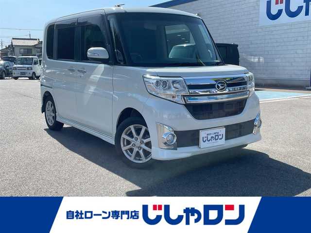 ダイハツ タント カスタム X トップED SA 和歌山県 2014(平26)年 12.8万km パール (株)IDOMが運営する【じしゃロン和歌山店】の自社ローン専用車両になります。こちらは現金またはオートローンご利用時の価格です。自社ローンご希望の方は別途その旨お申付け下さい/片側パワースライドドア /スマートキー/プッシュスタート/ハーフレザーシート/衝突被害軽減ブレーキ/横滑り防止装置/アイドリングストップ/純正フロアマット/純正１４インチアルミホイール