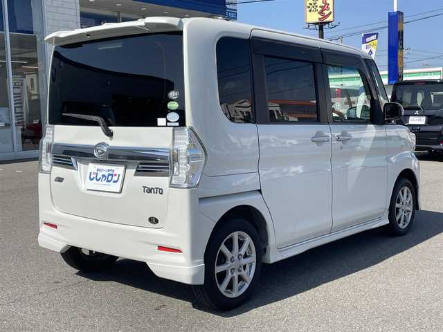 ダイハツ タント カスタム X トップED SA 和歌山県 2014(平26)年 12.8万km パール (株)IDOMが運営する【じしゃロン和歌山店】の自社ローン専用車両になります。こちらは現金またはオートローンご利用時の価格です。自社ローンご希望の方は別途その旨お申付け下さい/片側パワースライドドア /スマートキー/プッシュスタート/ハーフレザーシート/衝突被害軽減ブレーキ/横滑り防止装置/アイドリングストップ/純正フロアマット/純正１４インチアルミホイール