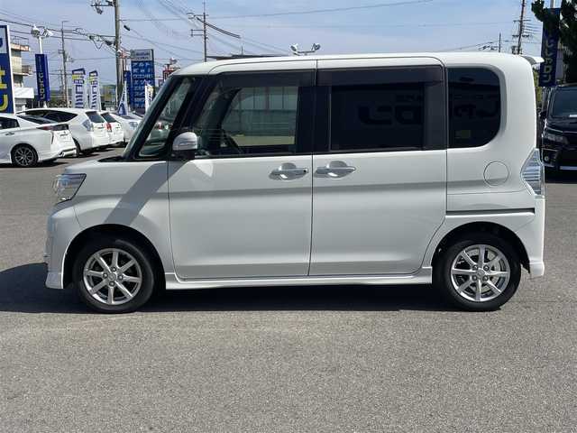 ダイハツ タント カスタム X トップED SA 和歌山県 2014(平26)年 12.8万km パール (株)IDOMが運営する【じしゃロン和歌山店】の自社ローン専用車両になります。こちらは現金またはオートローンご利用時の価格です。自社ローンご希望の方は別途その旨お申付け下さい/片側パワースライドドア /スマートキー/プッシュスタート/ハーフレザーシート/衝突被害軽減ブレーキ/横滑り防止装置/アイドリングストップ/純正フロアマット/純正１４インチアルミホイール