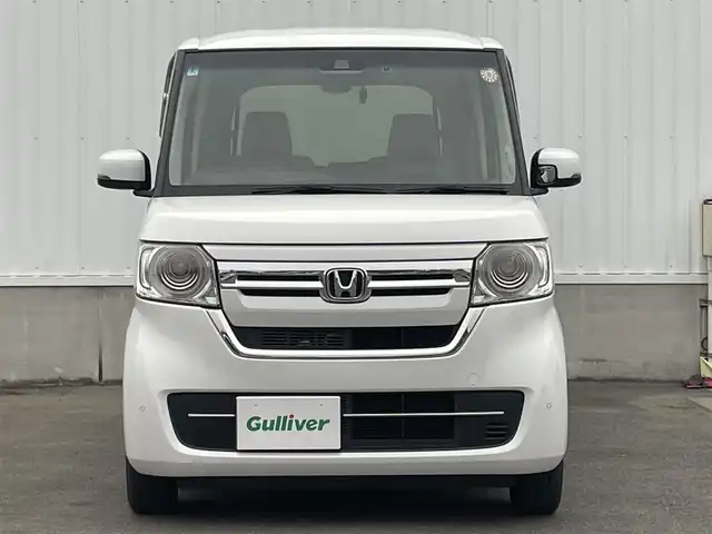 ホンダ Ｎ ＢＯＸ L 愛媛県 2022(令4)年 1.3万km プラチナホワイトパール 純正ナビ　/フルセグTV/Bluetooth接続/バックカメラ　/ETC　/前後ドライブレコーダー　/ホンダセンシング　/・衝突軽減ブレーキ/・前後方　誤発進抑制機能/・歩行者事故低減ステアリング/・先行車発進お知らせ機能/・渋滞追従機能付きアダプティブクルーズコントロール/・車線維持支援システム/・オートハイビーム/・標識認識機能/・路外逸脱抑制機能/電動スライドドア　/電動パーキングブレーキ　/ＬEDヘッドライト　/D/N席シートヒーター/ドアバイザー/ISOFIX/純正ホイールキャップ/現状サマー(鉄)(155/65/R14)/DUNLOP ENASAVE EC300