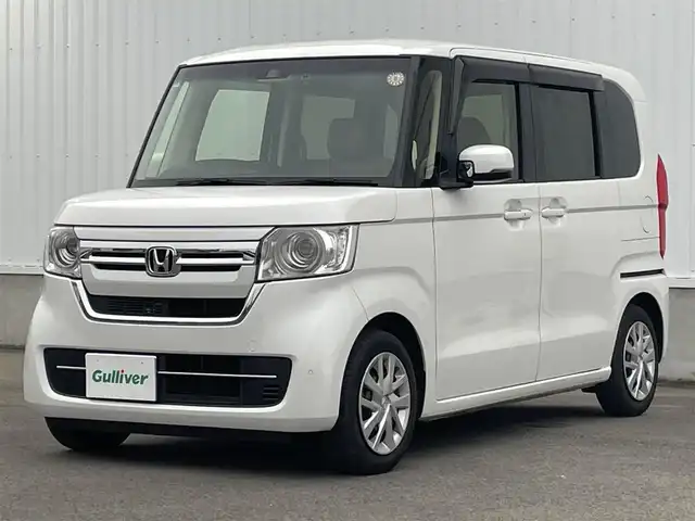 ホンダ Ｎ ＢＯＸ L 愛媛県 2022(令4)年 1.3万km プラチナホワイトパール 純正ナビ　/フルセグTV/Bluetooth接続/バックカメラ　/ETC　/前後ドライブレコーダー　/ホンダセンシング　/・衝突軽減ブレーキ/・前後方　誤発進抑制機能/・歩行者事故低減ステアリング/・先行車発進お知らせ機能/・渋滞追従機能付きアダプティブクルーズコントロール/・車線維持支援システム/・オートハイビーム/・標識認識機能/・路外逸脱抑制機能/電動スライドドア　/電動パーキングブレーキ　/ＬEDヘッドライト　/D/N席シートヒーター/ドアバイザー/ISOFIX/純正ホイールキャップ/現状サマー(鉄)(155/65/R14)/DUNLOP ENASAVE EC300
