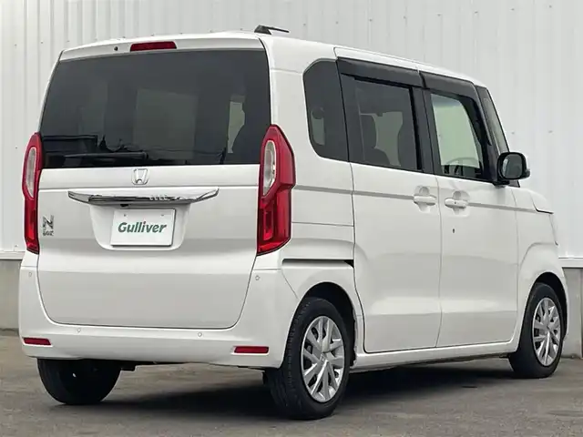 ホンダ Ｎ ＢＯＸ L 愛媛県 2022(令4)年 1.3万km プラチナホワイトパール 純正ナビ　/フルセグTV/Bluetooth接続/バックカメラ　/ETC　/前後ドライブレコーダー　/ホンダセンシング　/・衝突軽減ブレーキ/・前後方　誤発進抑制機能/・歩行者事故低減ステアリング/・先行車発進お知らせ機能/・渋滞追従機能付きアダプティブクルーズコントロール/・車線維持支援システム/・オートハイビーム/・標識認識機能/・路外逸脱抑制機能/電動スライドドア　/電動パーキングブレーキ　/ＬEDヘッドライト　/D/N席シートヒーター/ドアバイザー/ISOFIX/純正ホイールキャップ/現状サマー(鉄)(155/65/R14)/DUNLOP ENASAVE EC300
