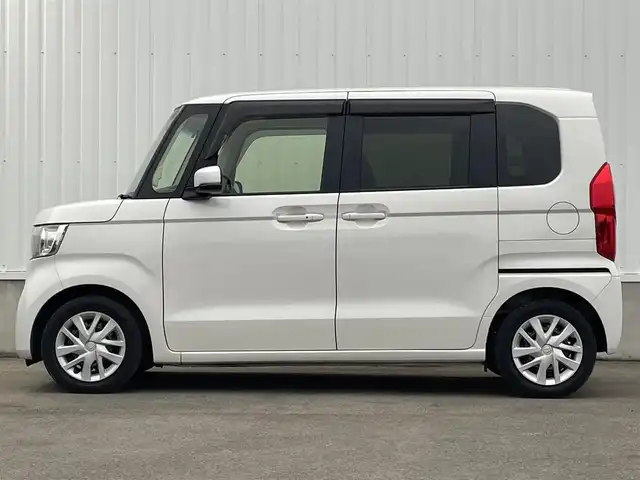 ホンダ Ｎ ＢＯＸ L 愛媛県 2022(令4)年 1.3万km プラチナホワイトパール 純正ナビ　/フルセグTV/Bluetooth接続/バックカメラ　/ETC　/前後ドライブレコーダー　/ホンダセンシング　/・衝突軽減ブレーキ/・前後方　誤発進抑制機能/・歩行者事故低減ステアリング/・先行車発進お知らせ機能/・渋滞追従機能付きアダプティブクルーズコントロール/・車線維持支援システム/・オートハイビーム/・標識認識機能/・路外逸脱抑制機能/電動スライドドア　/電動パーキングブレーキ　/ＬEDヘッドライト　/D/N席シートヒーター/ドアバイザー/ISOFIX/純正ホイールキャップ/現状サマー(鉄)(155/65/R14)/DUNLOP ENASAVE EC300
