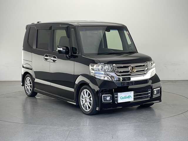 ホンダ Ｎ ＢＯＸ カスタム G ターボ Lパッケージ 長野県 2016(平28)年 3.8万km スマートブラック 純正SDナビ&フルセグTV&CD&DVD&BT/クルーズコントロール/衝突軽減ブレーキ/アイドリングストップ/社外デジタルインナーミラー/両側パワースライドドア/ハーフレザーシート/ステアリングスイッチ/パドルシフト/2列目サンシェード/バックカメラ/LEDヘッドライト/オートライト/フロントフォグランプ/電動格納ミラー/ウィンカーミラー/社外14インチAW装着/純正フロアマット/プッシュスタート/スマートキー/スペアキー1本/ナビ取扱説明書