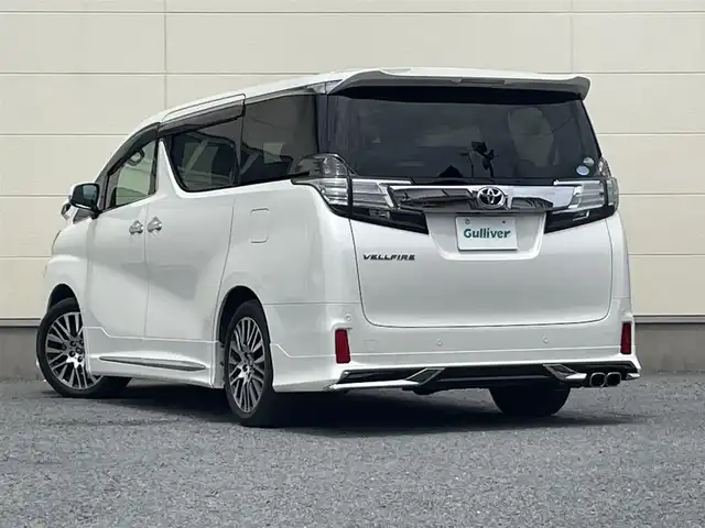 トヨタ ヴェルファイア Z Gエディション 茨城県 2015(平27)年 3.3万km ホワイトパールクリスタルシャイン ・後席用フリップダウンモニター/・サンルーフ/・純正ナビ（CD/DVD/BT/USB）/・モデリスタエアロ/・バックカメラ/・純正18インチAW/・ビルトインETC/・レーダークルーズコントロール/・衝突被害軽減システム/・アイドリングストップ/・前席パワーシート/・ステアリングヒーター/・電動リアゲート/・両側パワースライドドア/・前後コーナーセンサー/・横滑り防止装置/・盗難防止装置/・LEDヘッドライト/・オートホールド