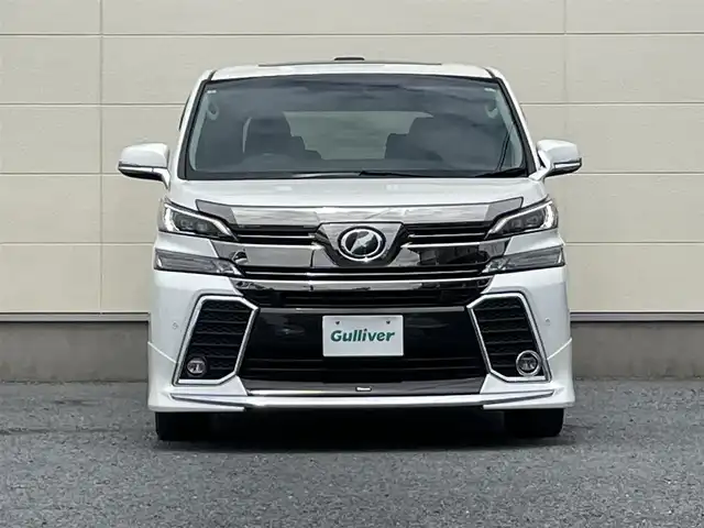 トヨタ ヴェルファイア Z Gエディション 茨城県 2015(平27)年 3.3万km ホワイトパールクリスタルシャイン ・後席用フリップダウンモニター/・サンルーフ/・純正ナビ（CD/DVD/BT/USB）/・モデリスタエアロ/・バックカメラ/・純正18インチAW/・ビルトインETC/・レーダークルーズコントロール/・衝突被害軽減システム/・アイドリングストップ/・前席パワーシート/・ステアリングヒーター/・電動リアゲート/・両側パワースライドドア/・前後コーナーセンサー/・横滑り防止装置/・盗難防止装置/・LEDヘッドライト/・オートホールド