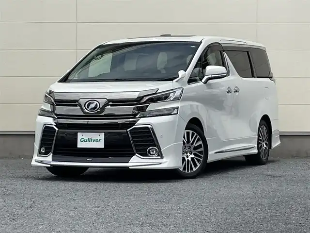 トヨタ ヴェルファイア Z Gエディション 茨城県 2015(平27)年 3.3万km ホワイトパールクリスタルシャイン ・後席用フリップダウンモニター/・サンルーフ/・純正ナビ（CD/DVD/BT/USB）/・モデリスタエアロ/・バックカメラ/・純正18インチAW/・ビルトインETC/・レーダークルーズコントロール/・衝突被害軽減システム/・アイドリングストップ/・前席パワーシート/・ステアリングヒーター/・電動リアゲート/・両側パワースライドドア/・前後コーナーセンサー/・横滑り防止装置/・盗難防止装置/・LEDヘッドライト/・オートホールド