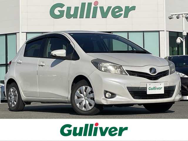 トヨタ ヴィッツ F スマイルエディション 佐賀県 2013(平25)年 10.4万km ホワイトパールクリスタルシャイン ワンオーナー/純正SDナビゲーション/・ワンセグTV/CD/SD/Bluetooth/前方ドライブレコーダー/ETC/N席買い物アシストシート/ISOFIX対応/社外LEDヘッドライト(ユニット純正・球をLEDに換装)/純正フォグランプ/純正フロアマット/純正ドアバイザ―/新車保証書/取扱説明書/スペアキー１本