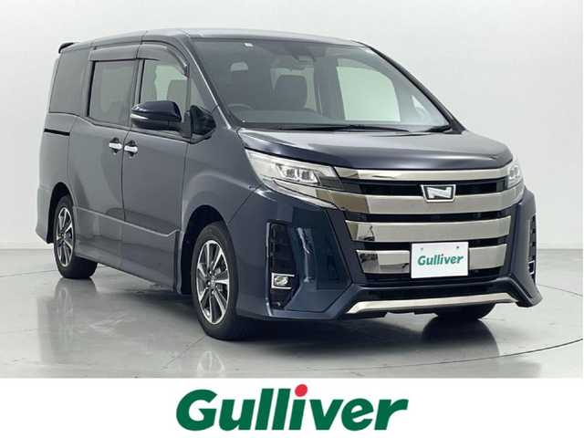 トヨタ ノア Si ダブルバイビーⅡ 熊本県 2019(令1)年 2.9万km ブラッキッシュアゲハガラスフレーク 純正9インチナビNSZT-Y68T　/Bluetooth/TV/CD/SDREC/オートクルーズコントロール　/両側パワースライドドア　/バックカメラ　/クルーズコントロール/ビルトインETC　/衝突被害軽減システム　/レーンキープアシスト　/コーナーセンサー　/横滑り防止システム/アイドリングストップ/先行車発進検知音/純正フロアマット/純正１６インチAW/オートライト/LEDヘッドライト/オートマチックハイビーム/フォグランプ/スマートキー/プッシュスタート/保証書