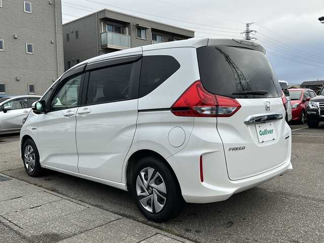 ホンダ フリード ハイブリット G ホンダセンシング 石川県 2018(平30)年 6.3万km ホワイトオーキッドパール 純正9型SDナビ(フルセグTV/CD/DVD/BT)/【VXM-187VFNi】/バックモニター/ホンダセンシング/両側パワースライドドア/前方ドライブレコーダー/ETC/純正LEDヘッドライト/純正フロアマット/スマートキー/スペアキー/プッシュスタート
