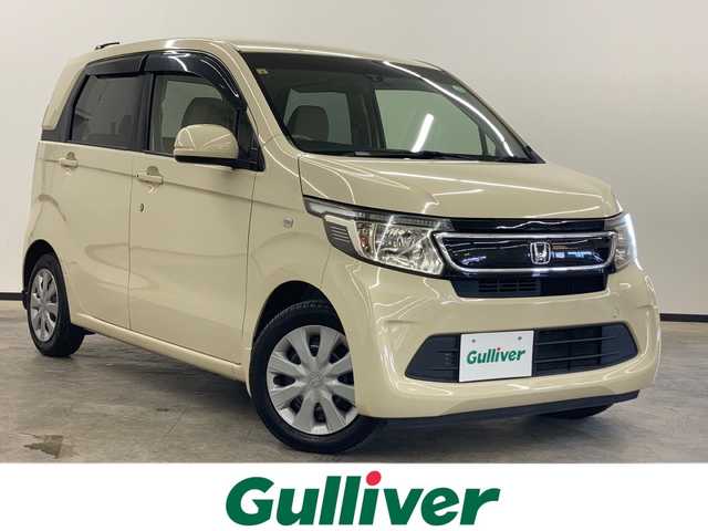 ホンダ Ｎ ＷＧＮ G Aパッケージ 長崎県 2014(平26)年 5.6万km クッキークリーム 純正ナビゲーション（AM/FM/CD、SD対応、ナビ型式VXM-145C）  /バックモニター  /衝突被害軽減ブレーキ（シティブレーキアクティブシステム）  /ドライブレコーダー  /純正LEDヘッドライト  /スマートキー  /プッシュスタート  /盗難防止装置  /横滑り防止装置  /純正フロアマット  /ベンチシート  /オートエアコン  /オートライト  /ステアリングリモコン  /アイドリングストップシステム  /パワーステアリング  /パワーウィンドウ  /ドアバイザー  /保証書  /取扱説明書  /スペアキー１本