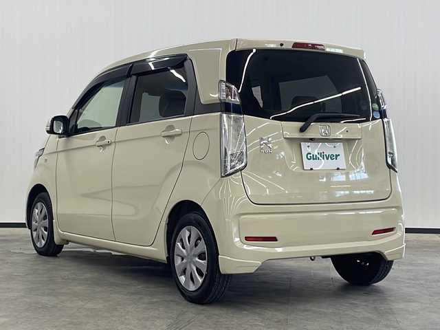 ホンダ Ｎ ＷＧＮ G Aパッケージ 長崎県 2014(平26)年 5.6万km クッキークリーム 純正ナビゲーション（AM/FM/CD、SD対応、ナビ型式VXM-145C）  /バックモニター  /衝突被害軽減ブレーキ（シティブレーキアクティブシステム）  /ドライブレコーダー  /純正LEDヘッドライト  /スマートキー  /プッシュスタート  /盗難防止装置  /横滑り防止装置  /純正フロアマット  /ベンチシート  /オートエアコン  /オートライト  /ステアリングリモコン  /アイドリングストップシステム  /パワーステアリング  /パワーウィンドウ  /ドアバイザー  /保証書  /取扱説明書  /スペアキー１本